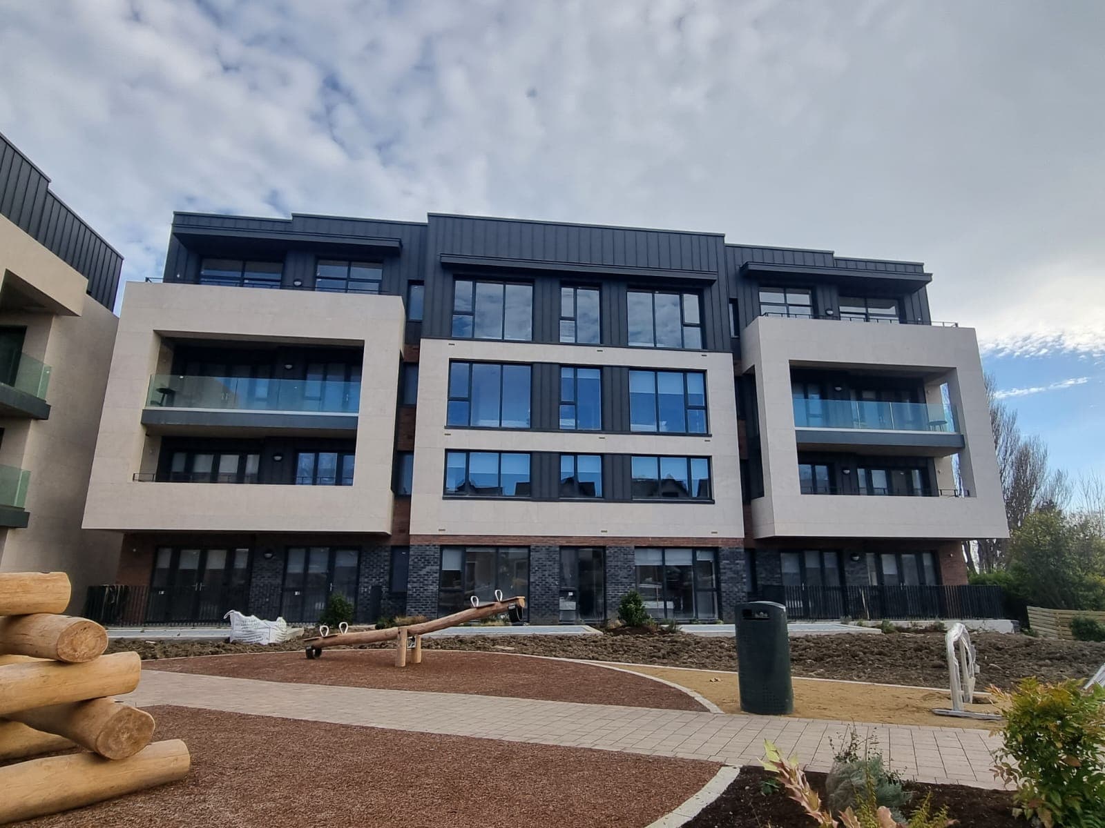 Modern apartment block with window and balcony glazing